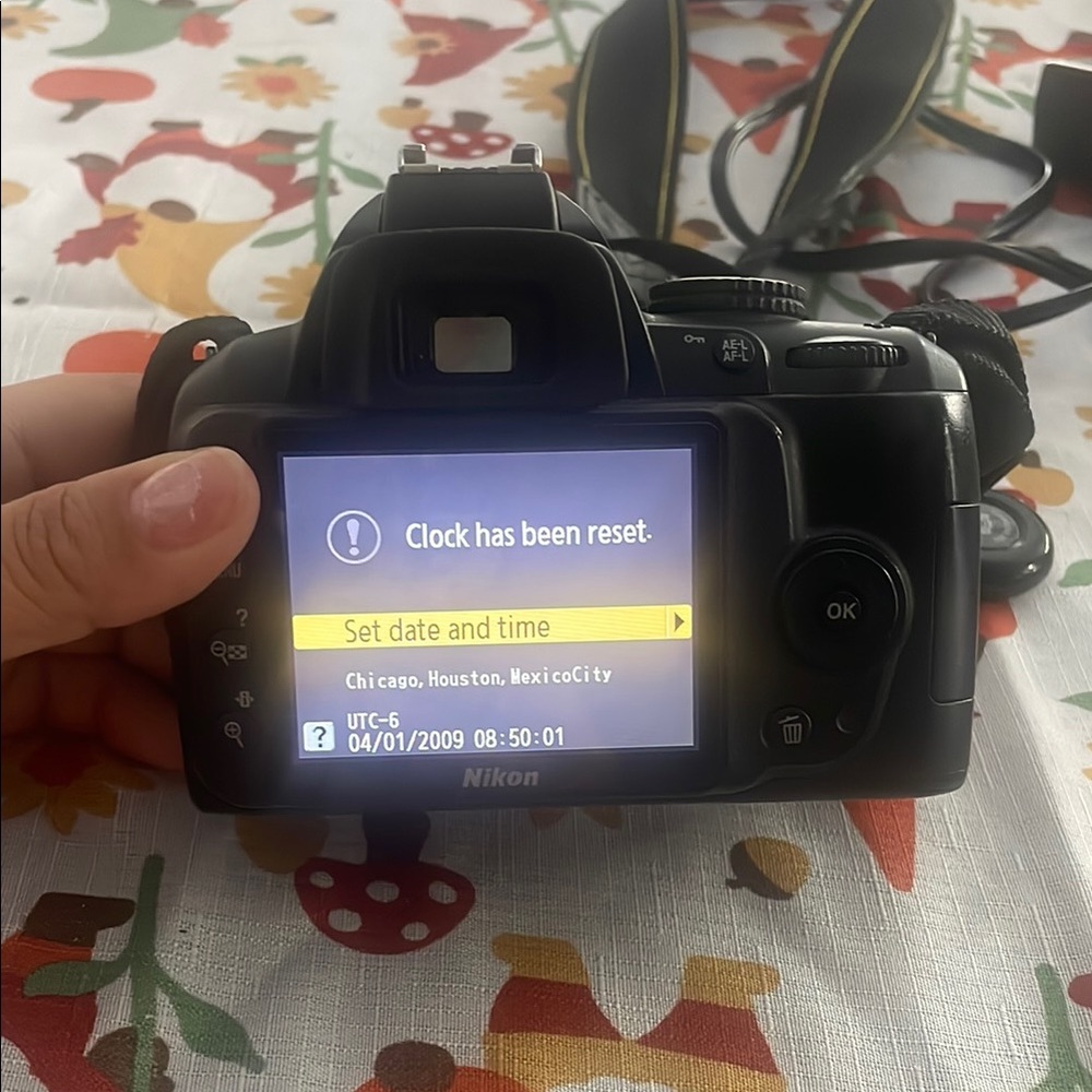 Nikon Black Digital Camera with Illuminated LCD Screen selling for parts.
